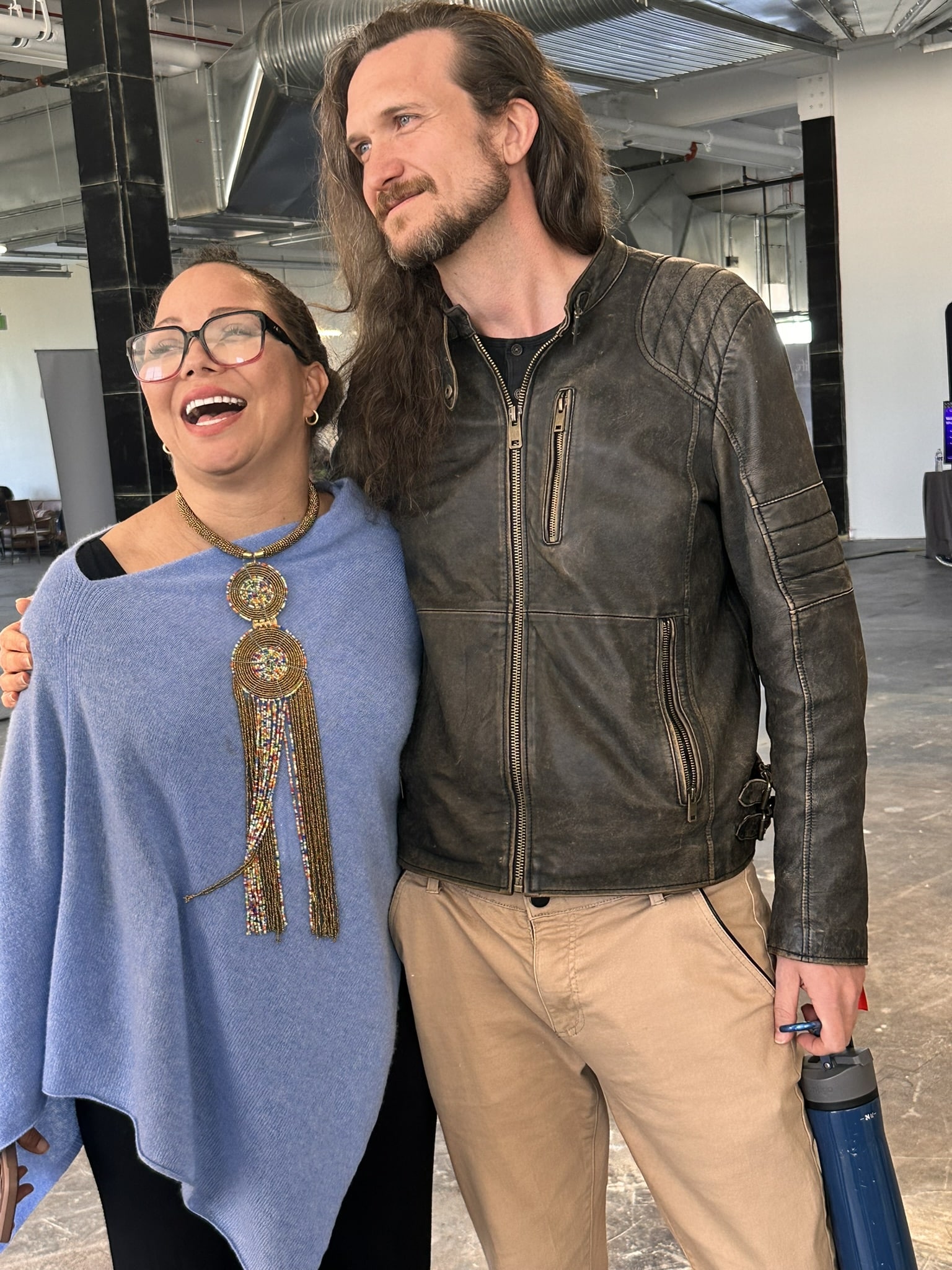 On the left, the producer of the show Nichol Bradford