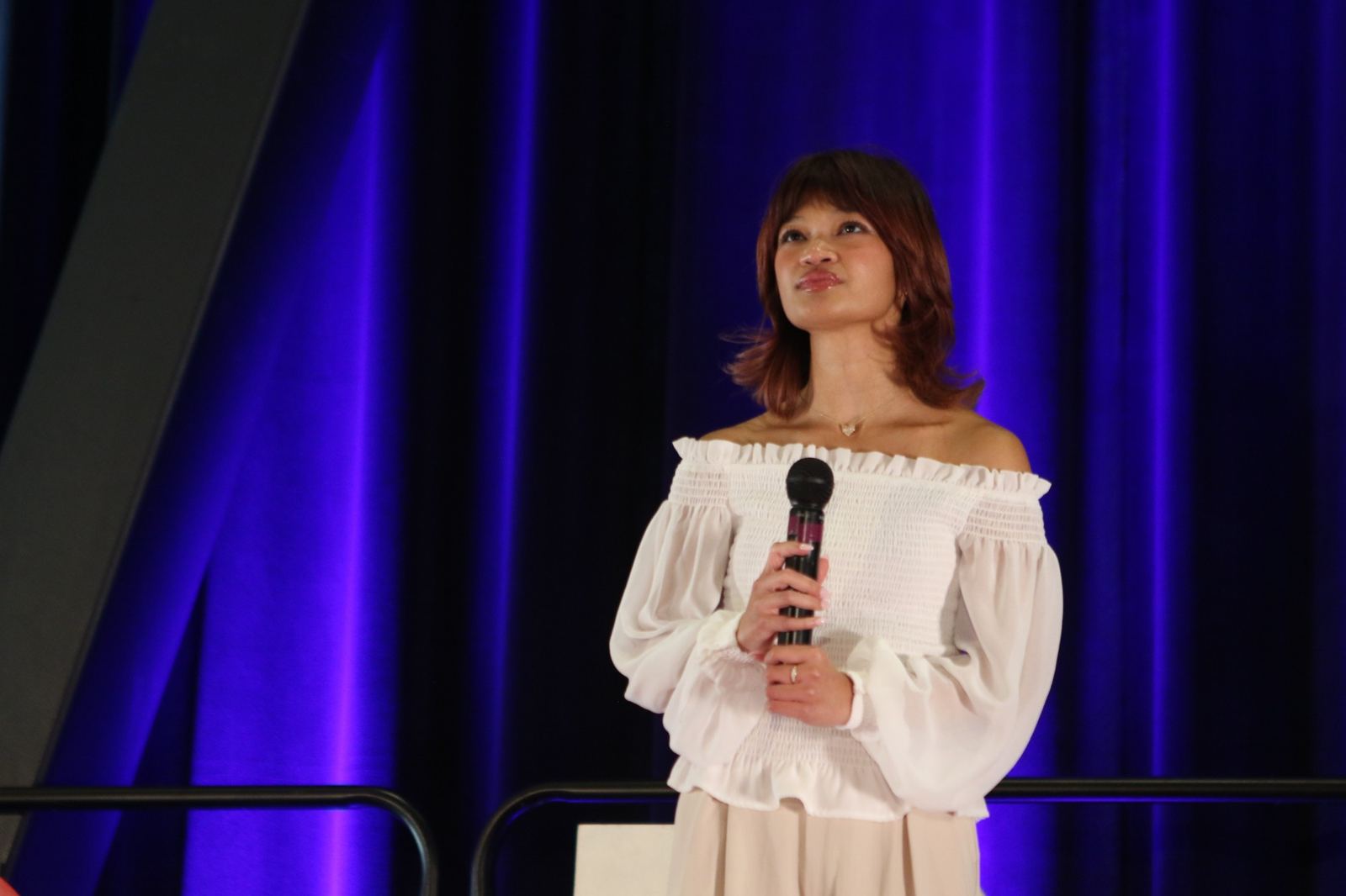 Angelica Hale singing at the microphone at TEDxBerkeley 2026